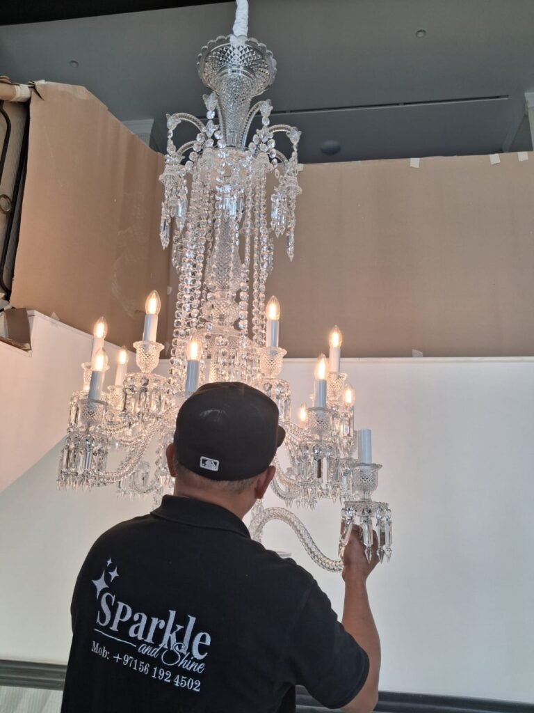 chandelier installation service in progress